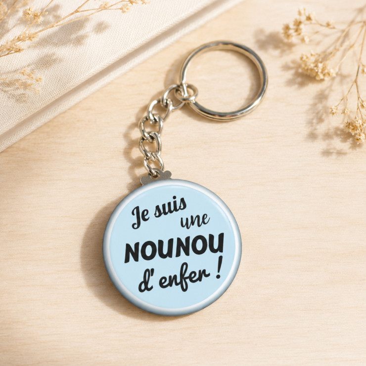       Porte clés "Je suis une nounou d'enfer" bleu
    