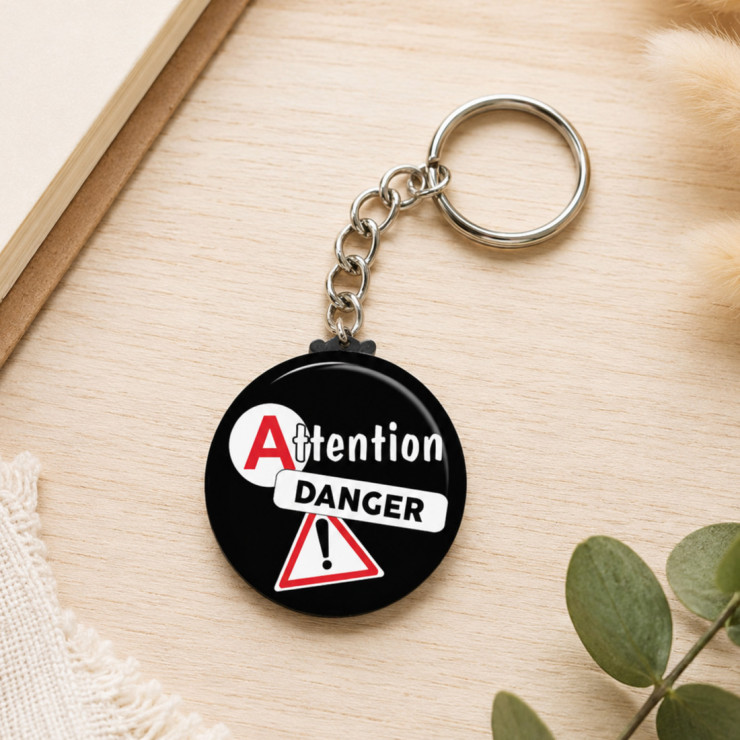       Porte clé Permis de conduire "Attention danger"
    