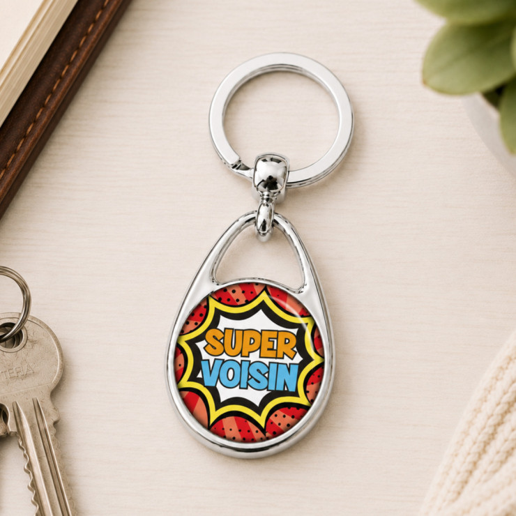                     Porte clés "Super voisin" comics
                  