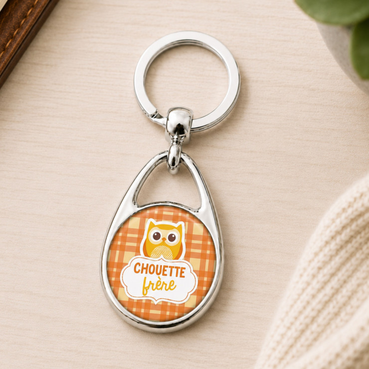                    Porte clés "chouette frère" orange
                  