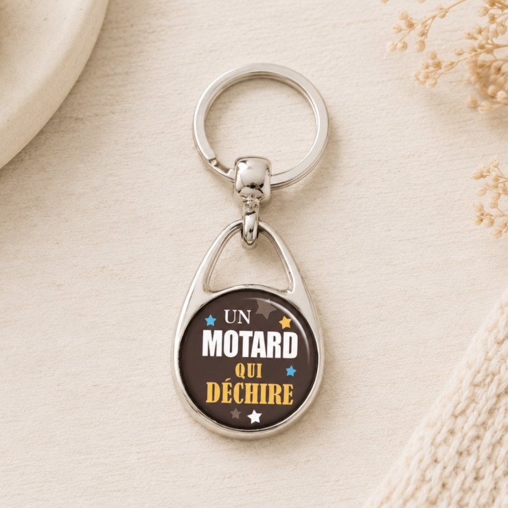                     Porte clé "Un motard qui déchire"
                  