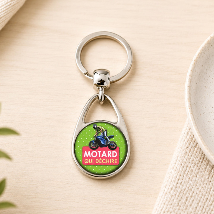                     Porte clé "Motard qui déchire"
                  