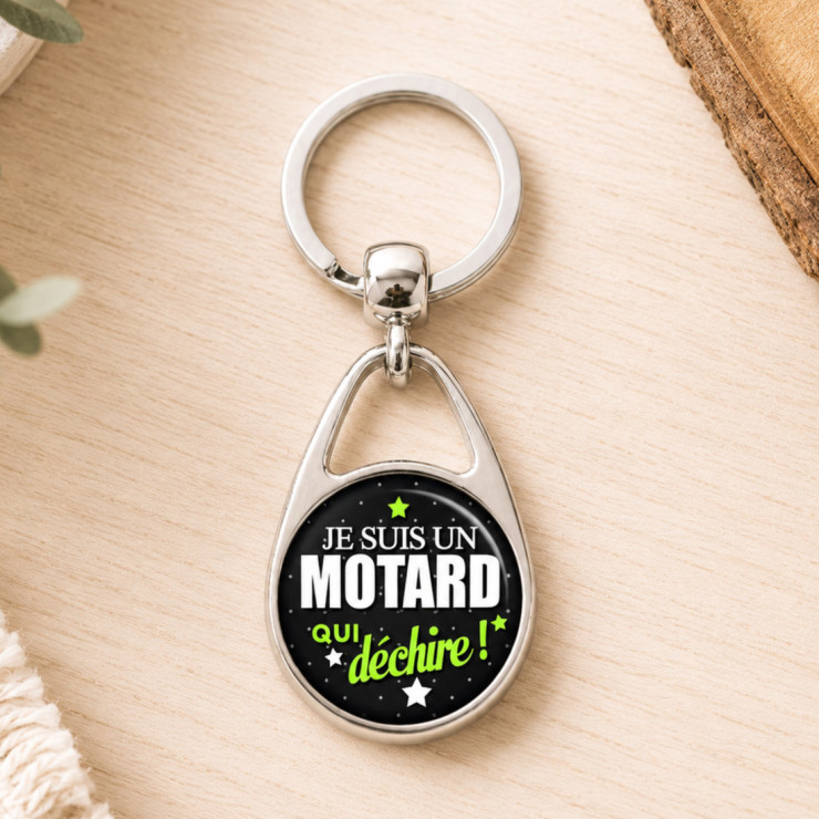       Porte clef motard qui déchire
    