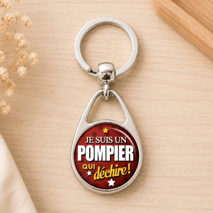       Porte clés Pompier qui déchire
    