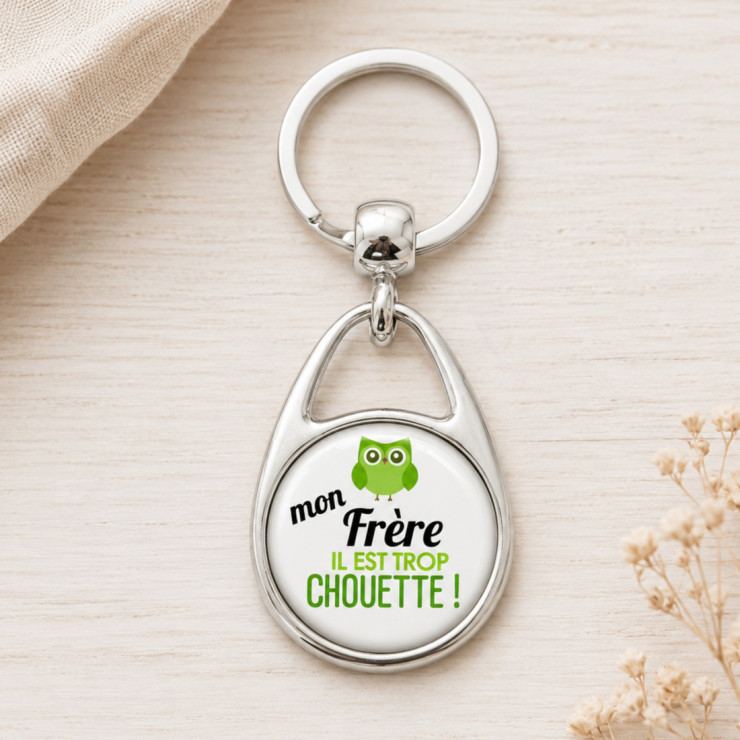                     Porte clé "Mon frère il est trop chouette !"
                  