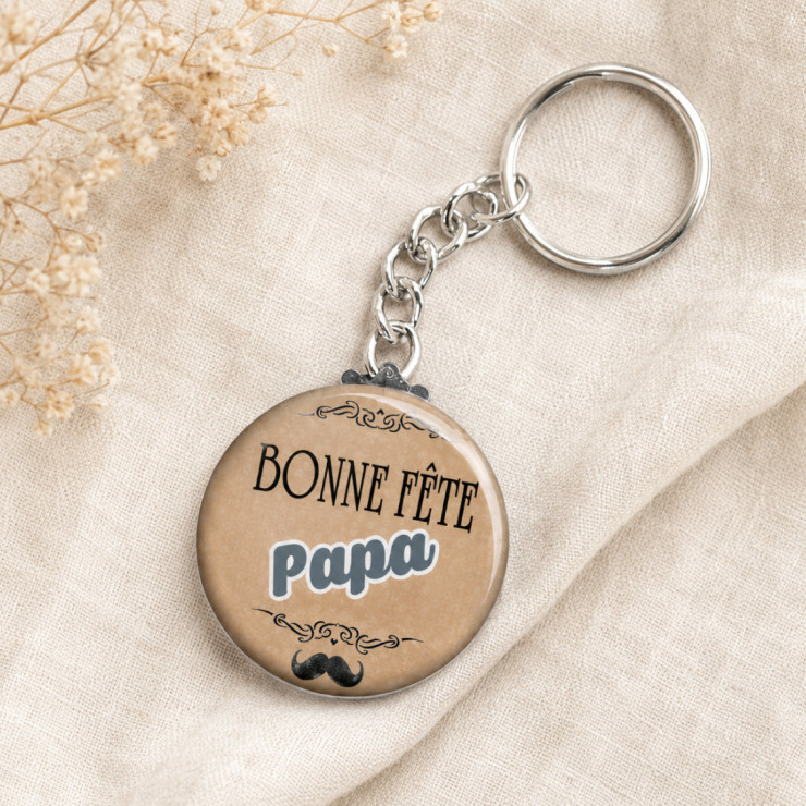                     Porte clé "Bonne fête papa"
                  