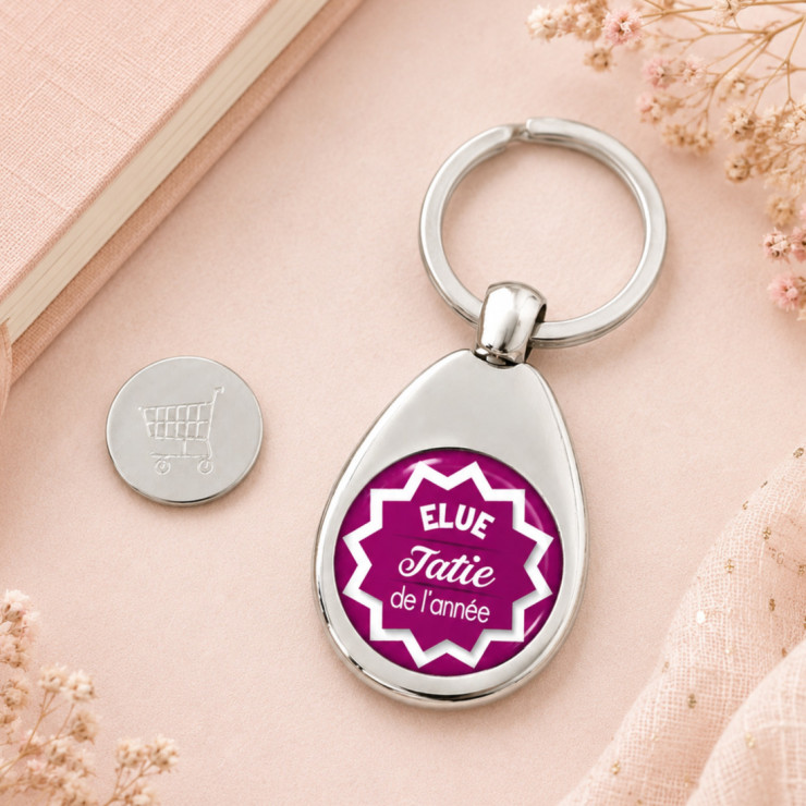                     Porte clés jeton de caddie Tatie
                  