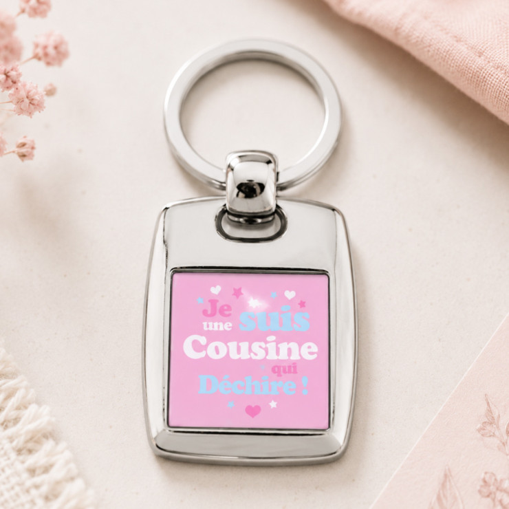                     Porte clefs Cousine qui déchire
                  