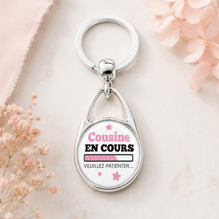                     Porte-clés 'Cousine en cours'
                  