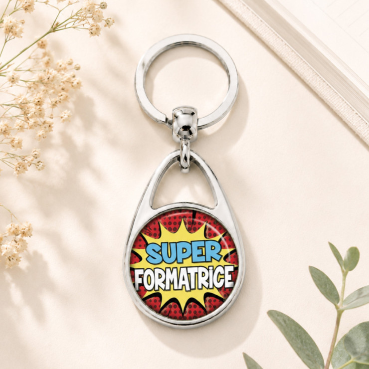                     Porte clés "Super formatrice" comics
                  