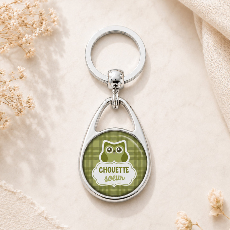                     Porte clés "chouette soeur" vert
                  