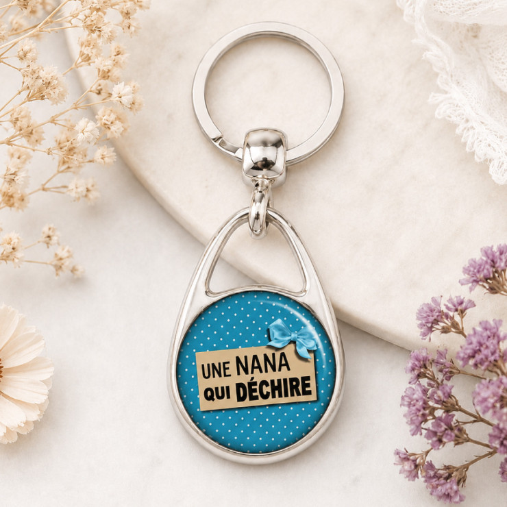                     Porte clés "Une nana qui déchire" bleu
                  