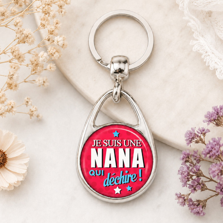                     Porte clés "Je suis une nana qui déchire" rose
                  