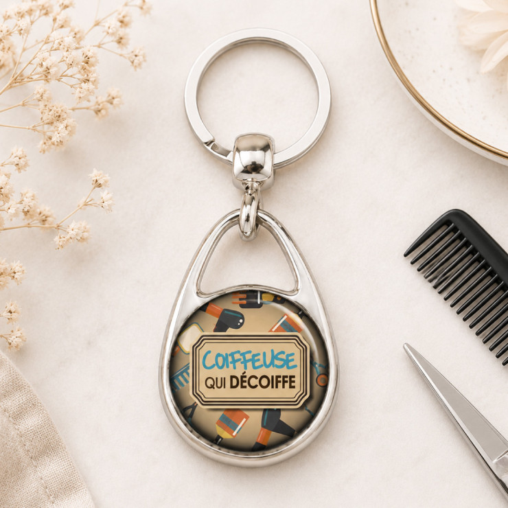       Porte clés Coiffeuse qui décoiffe
    