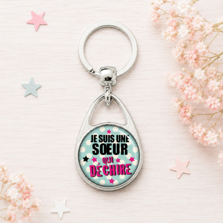       Porte clé "Je suis une soeur qui déchire!"
    