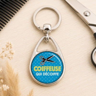 Un petit cadeau à offrir, un porte clé "Coiffeuse qui décoiffe"