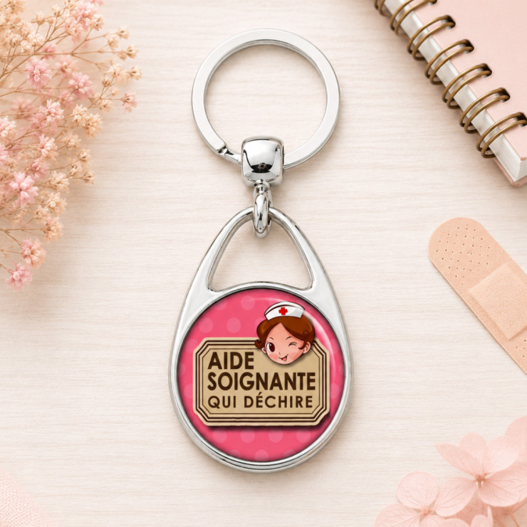       Porte clés "Aide soignante qui déchire" orange
    