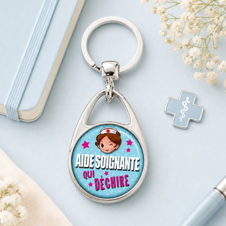       Porte clefs Aide soignante qui déchire
    