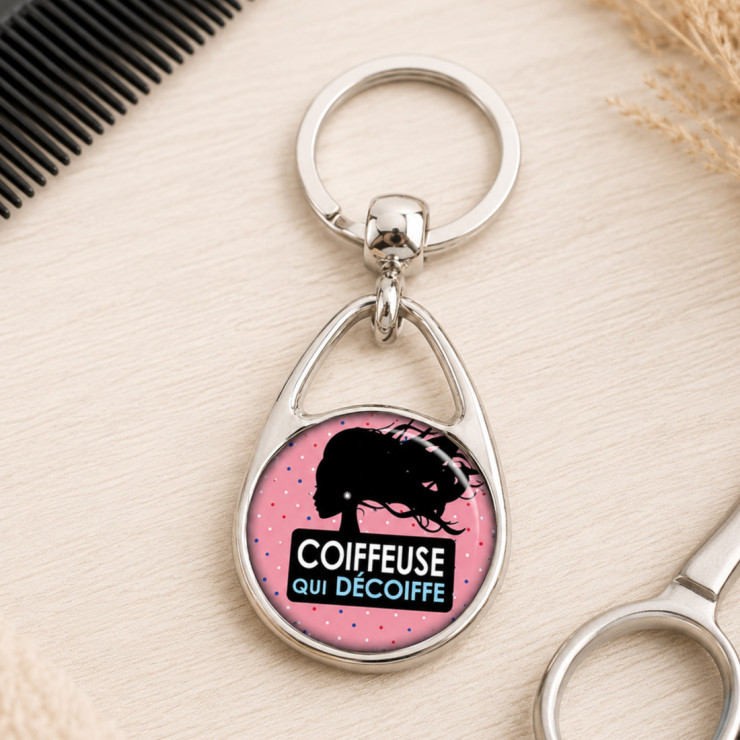       Porte clés pour une "Coiffeuse qui décoiffe"
    