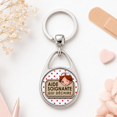 Porte clé pour une Aide soignante qui déchire Idée cadeau