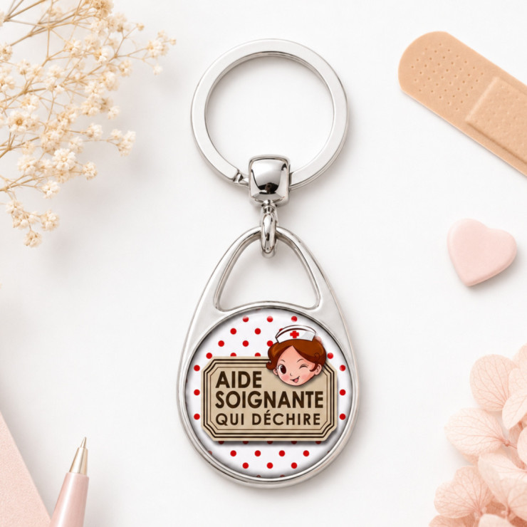                     Porte clés "Aide soignante qui déchire" blanc
                  