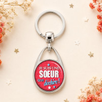 Beau porte clé "Je suis une sœur qui déchire!"