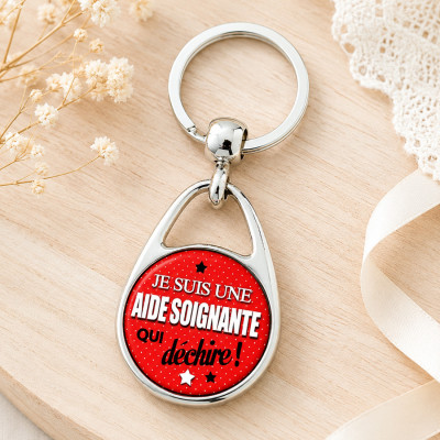 Un cadeau Porte clé "Je suis une aide soignante qui déchire !"